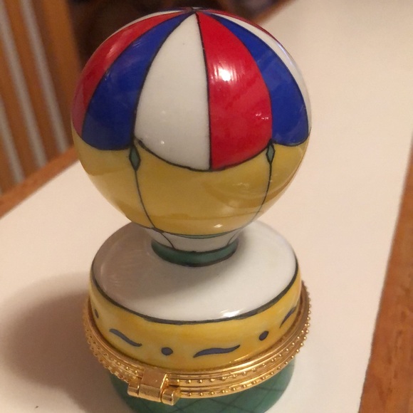 Hot air balloon trinket box colors are red white blue, yellow, green gold trim. - Picture 2 of 3